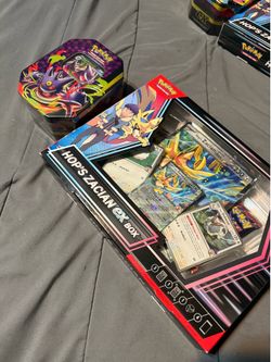 Hops Zacian EX Box and Mega Gengar Tin.