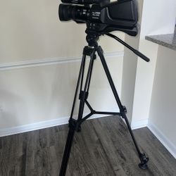 Professional-grade Panasonic AG-AC8 camcorder.