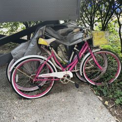 Two Beach Cruiser Bikes, Flat Tires And Rusty Chains 