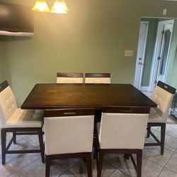 Solid Wood Kitchen Table With Bar Stools And A Bench 