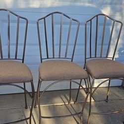 ** 3 solid metal barstools **