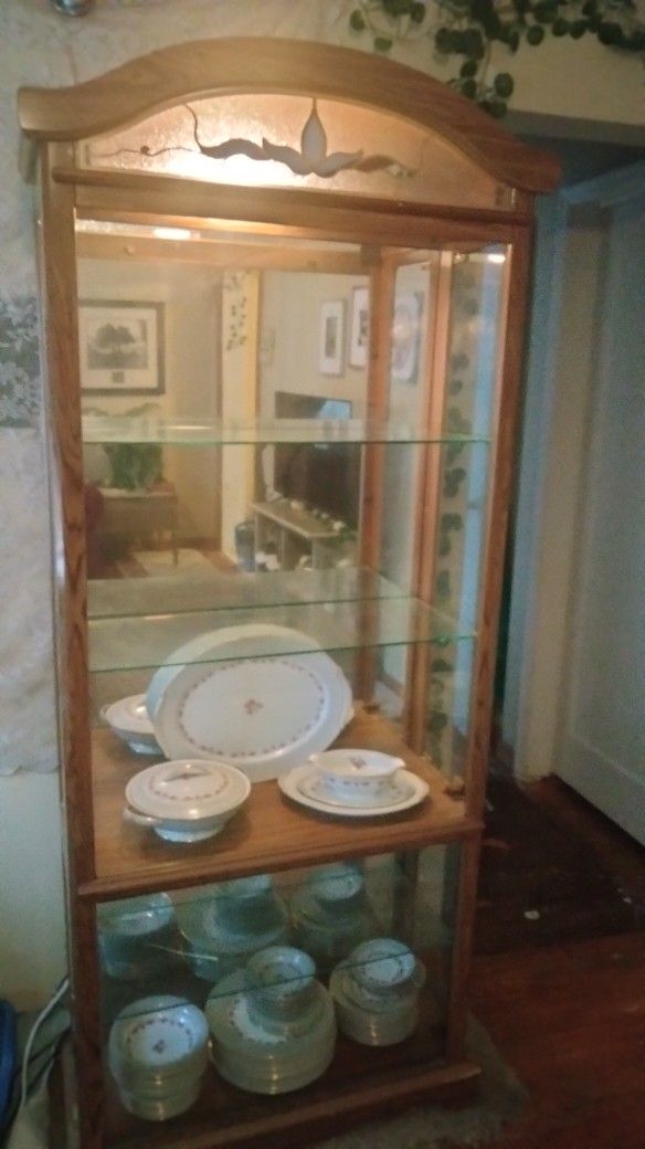 MUST SELL...leaving town tomorrow/Lighted curio cabinet