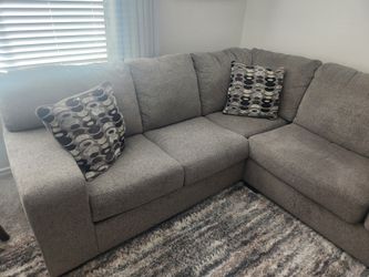 Taupe-grey three piece sectional