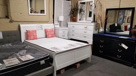 Brand new white full size sleigh bedframe (box spring is required)