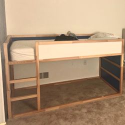 IKEA reversible children’s twin bed with mattress