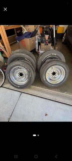 4 BFGoodrich Radial T/A Tires on Chrome Wheels 14" & 15"