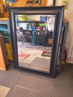 Black framed mirror