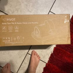 A pet grooming, kit, and vacuum