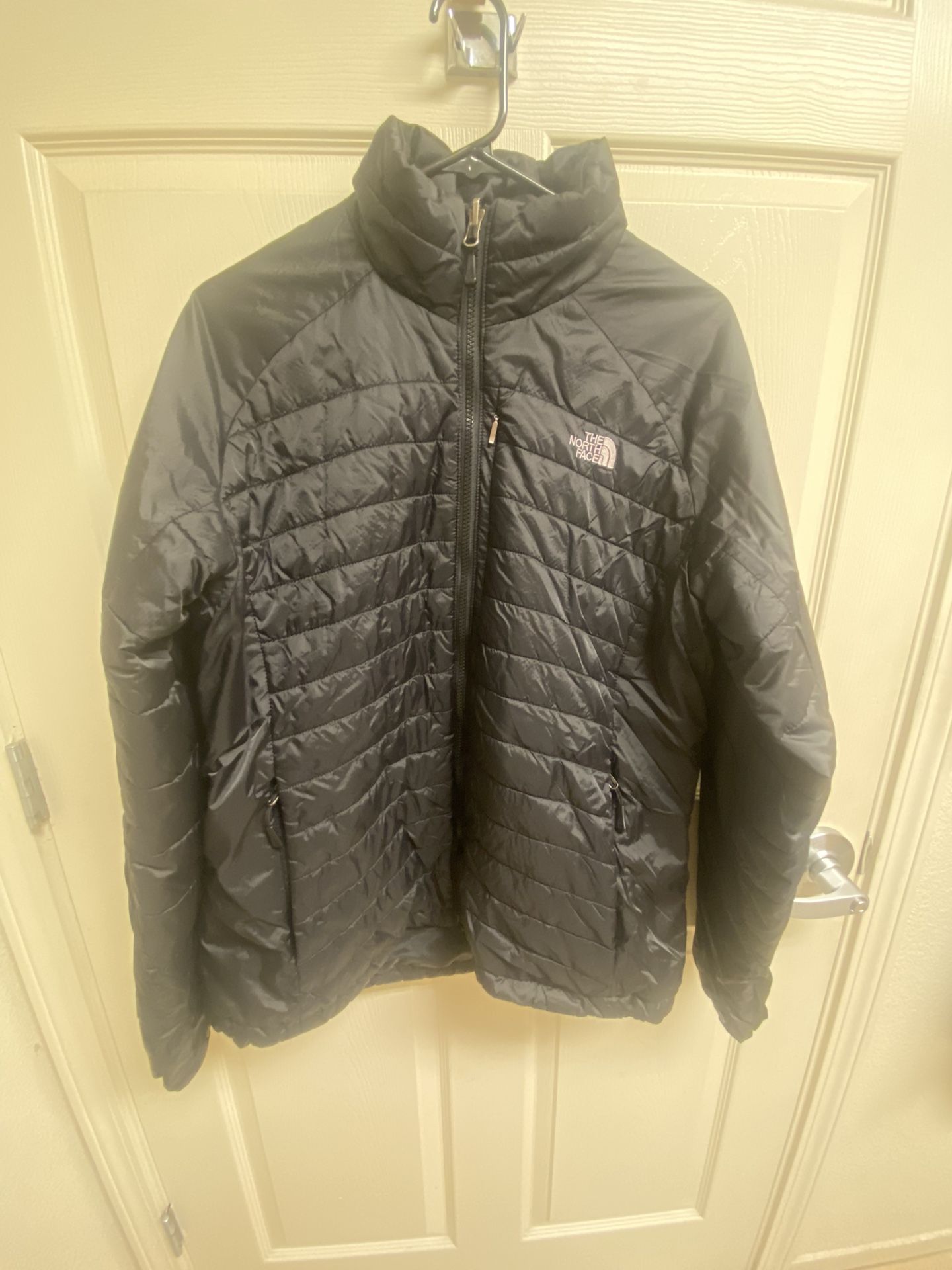 Woman’s The North Face Jacket 9