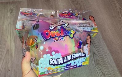 Rainbow Tie Dye Squeeze Duckies Squishy Toy