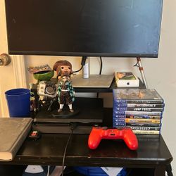 PS4 With Controller And Games Also A Go Pro