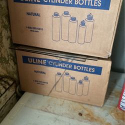 Cylinder bottles, brand, new case and a half