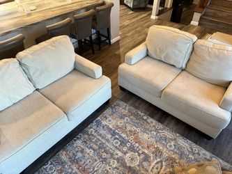 2 matching love seats from Living Spaces