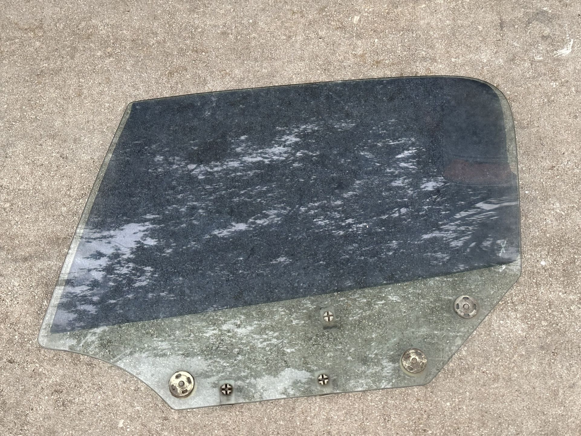 Mazda Miata NA driver window glass