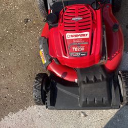 Troy Bilt lawnmower 22 inch cut 7.5 motor big wheel new front tires pull it one time cut your grass all the time it’s ready to go