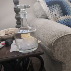 Wine Bottle With Sailboat Etched Into The Glass