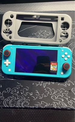 Nintendo Switch Lite Turquoise with ARMS Game and grip case