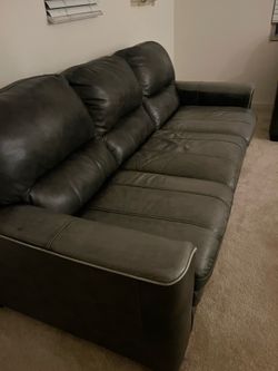 Dark Grey Leather Sofa – Fair Condition | Price Negotiable