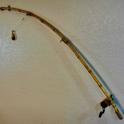 Handcrafted bamboo-style fishing pole wall decor. Great for cabin, lake house, lodge, man cave, or rustic home decor.