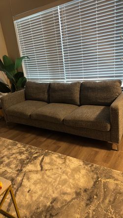 Modern grey couch- need gone ASAP (pickup only)