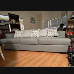GREY COUCH + DECORATIVE PILLOWS 