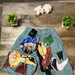 Brand NEW Nike Teal Cartoon Shorts For Men. (Size M)