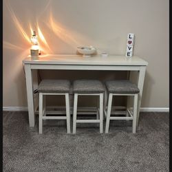 CREAM ISLAND TABLE WITH THREE STOOLS