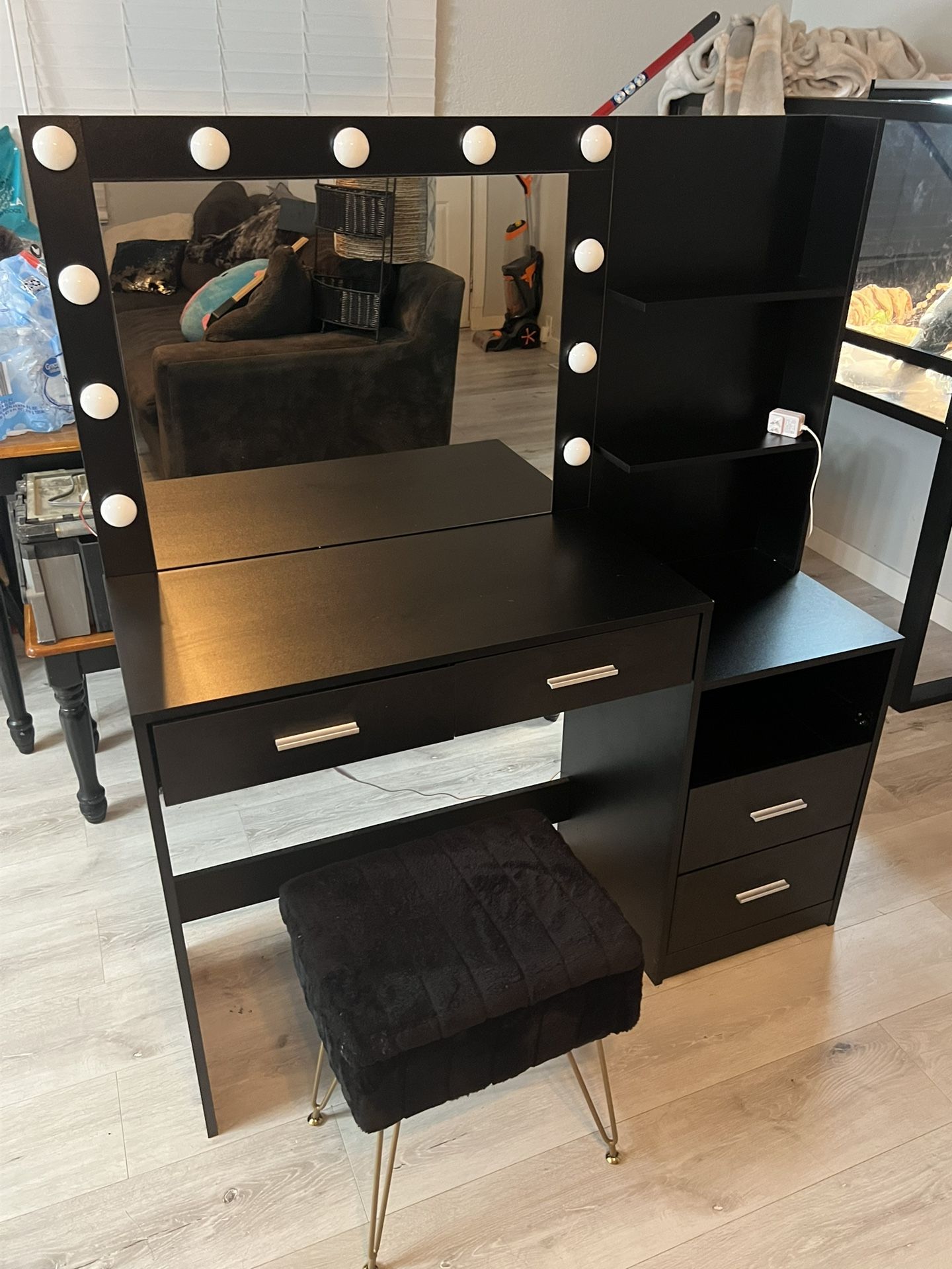 black vanity and stool.