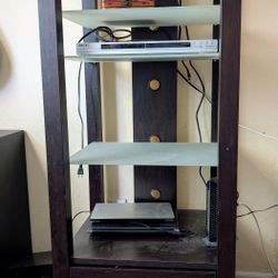 dark wood and glass media storage shelf, four adjustable shelves and drawer