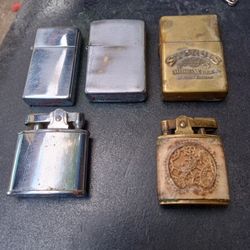 2 Vintage Zippo Lighters One Buxton Leather Wrapped Mase In Japan & the 1938 Sturgis Bike Week Lifter Whole Collection 100$