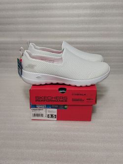 Skechers slip on sneakers. New in box. White. Super comfy. Washable. Size 8.5 women's shoes. Authentic