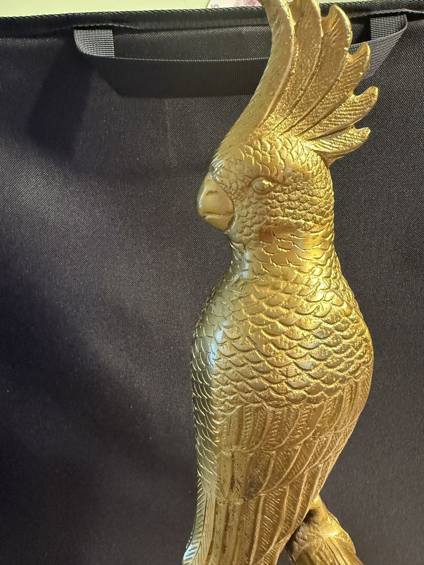 A 22 1/2 Inch Bird Perched Statue