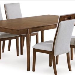 Lyncott Dining Table and 4 Chairs in Brown
