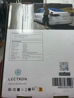 “Open box, never used. Lectron Level 1 Tesla/NACS portable EV charger, 15A, 120V, 16ft cable.”