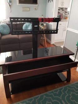 Tv stand holds up to 55’