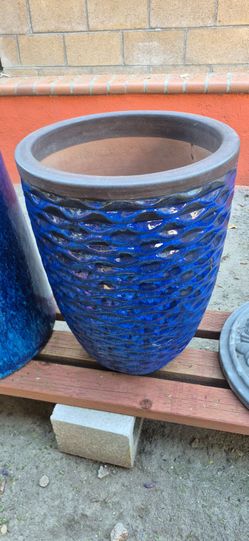 Textured tall blue ceramic pot