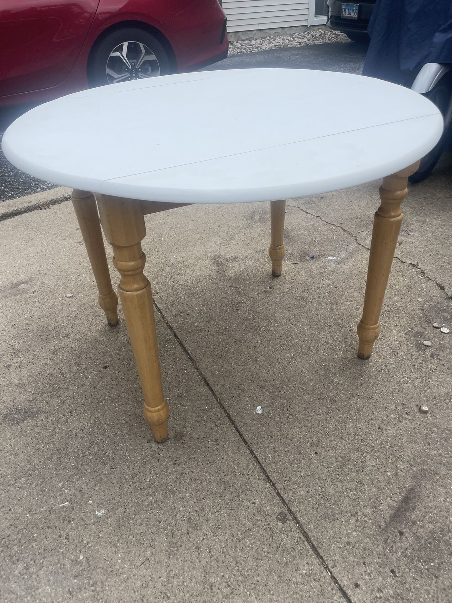 Vintage Wooden Table with fold down leafs, 40 in Round open, 30 high, 28 wide closed , $35