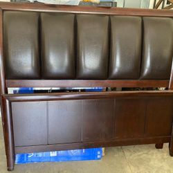 Queen-size wooden bed