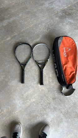 Two tennis rackets with carrying case