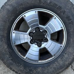 One wheel 🛞 with tires size 17 for Toyota Tacoma