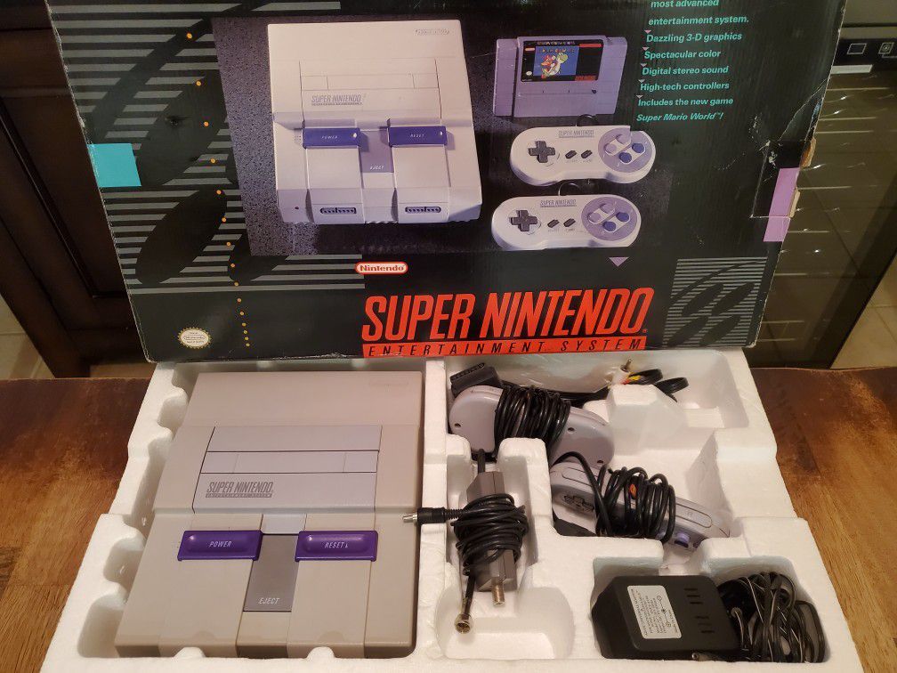 Super nintendo with 31 games and a genie