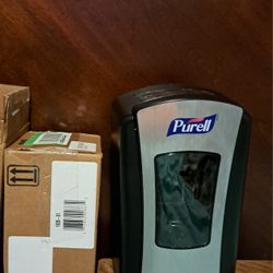 Gojo automatic 1928-01 purell dispencer brand new from Amazon