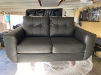 one Leather love seats **like new cindition*