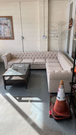 (In store) Tan cream colored tufted sectional couch