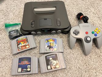 N64 console, controller, booster pack & games