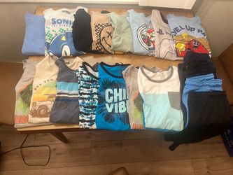 Boys clothes size 14-16 —8 t- shirts  7 tank tops 4 shorts very nice