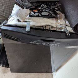 Black GE Dishwasher And Gas Range