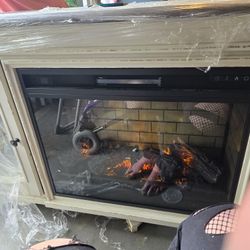 Realyn 74" Tv Stand With Electric Fireplace