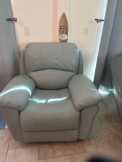 2 light blue seafoam recliners
