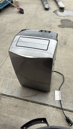 LG LP1417SHR Portable Air Conditioner. 3-in-1 unit that provides cooling, heating, and dehumidification.